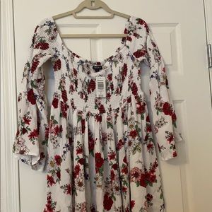 Off-shoulder white smocked dress